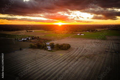 Aerial of Sunset with Fall Foliage © Jin