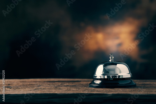 Bell of service on wood