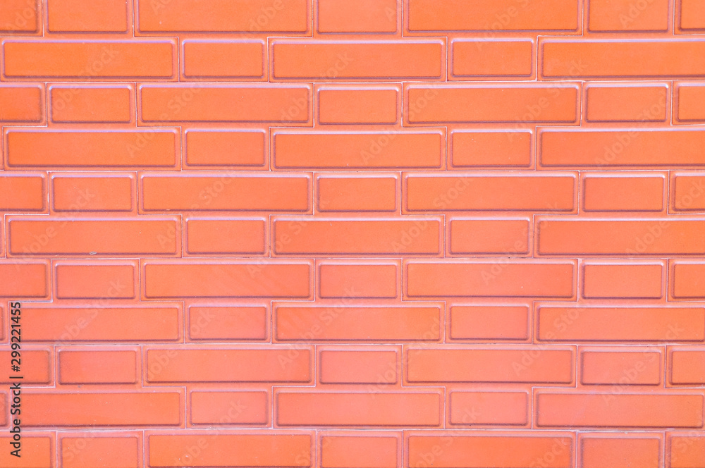 Pale red glazed brick surface, empy space for backgrounds or backdrops. Pale red glazed brick surface, empy space for backgrounds or backdrops.