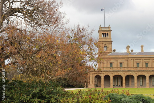 details of the old world architecture on the grand mansion viewed through the gardens at Werribee mansion, an old large Australian property near Melbourne Victoria, Australia photo