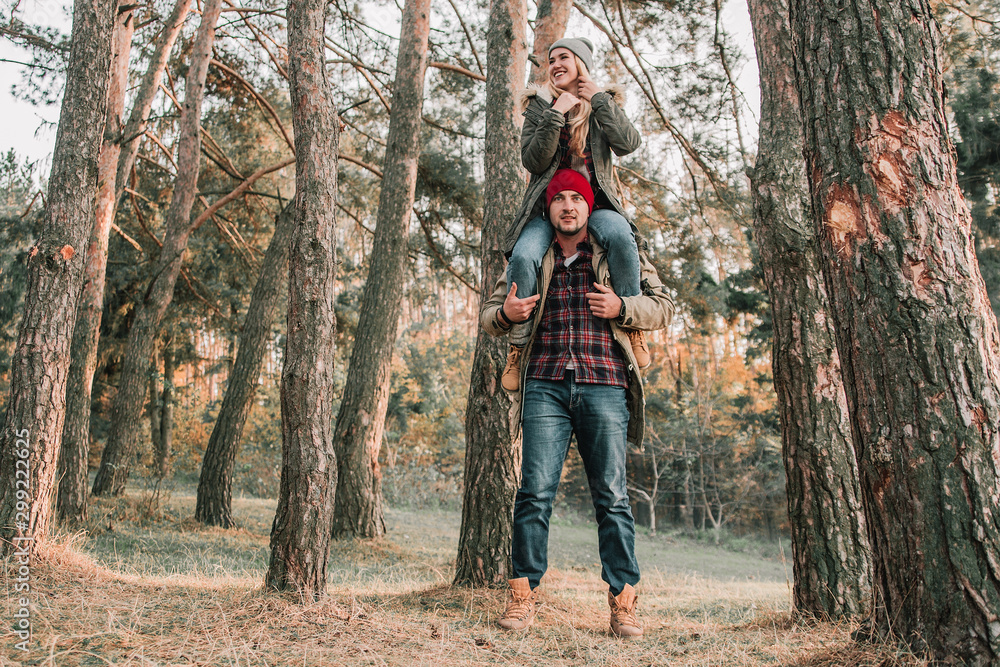 Couple travelers is so fun in the forest. Concept of trekking, adventure and seasonal vacation.