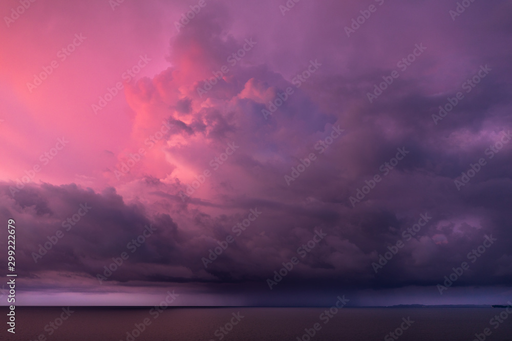 Photo of stormy clouds at sunset