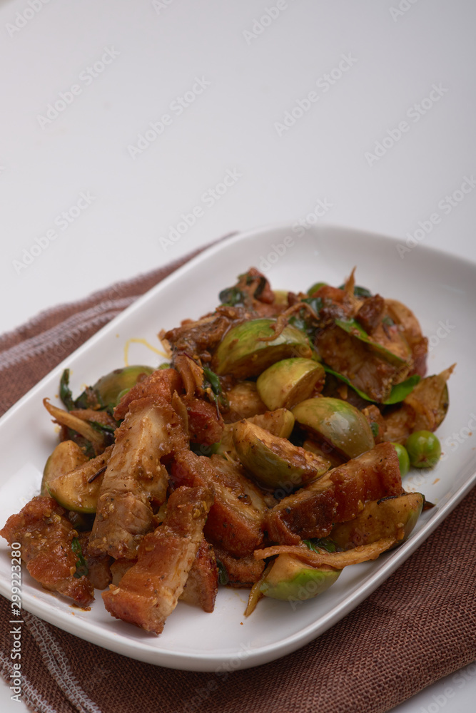 Stir fried crispy fork with red curry. Stir fried crispy fork with red curry.