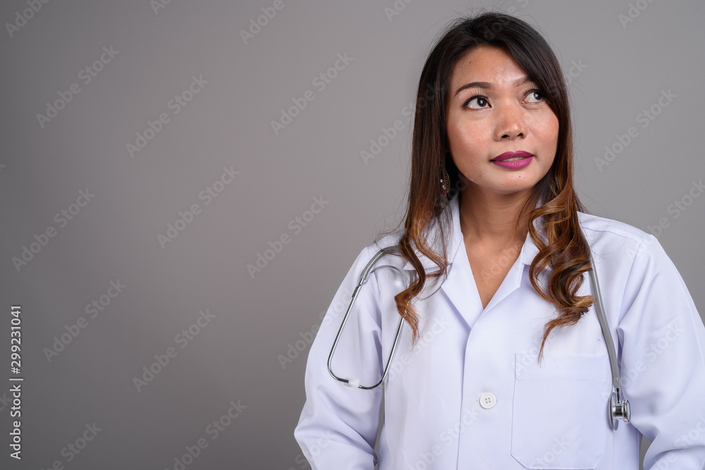 Portrait of Asian woman doctor with wavy hair Portrait of Asian woman doctor with wavy hair