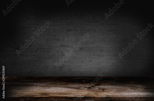 Empty top retro wooden table with dark black brick wall background