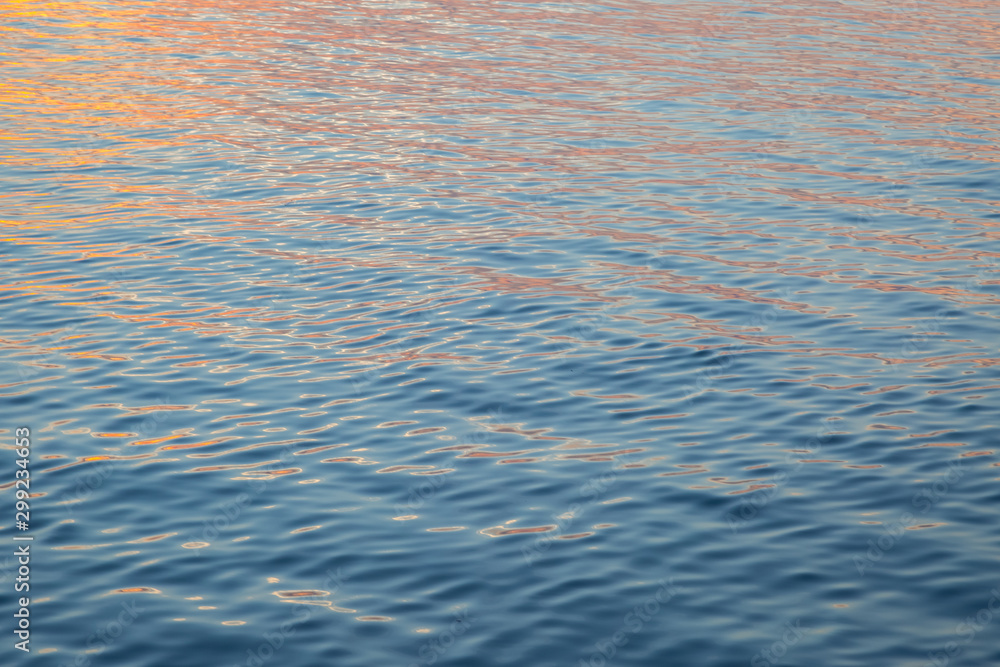 Waves and reflections before sunset Waves and reflections before sunset