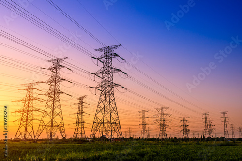 High voltage electricity tower sky sunset landscape,industrial background.