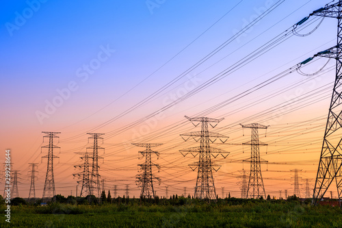 High voltage electricity tower sky sunset landscape,industrial background.