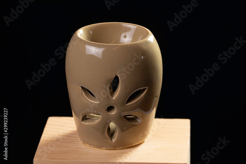 Porcelain vase on black background close up