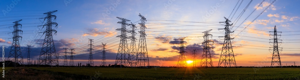 High voltage electricity tower sky sunset landscape,industrial background.