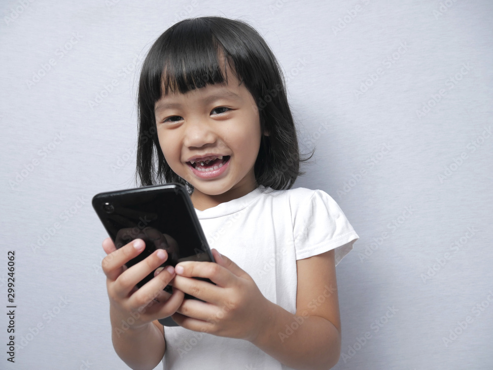 Little Girl With Smart Phone Gadget Little Girl With Smart Phone Gadget