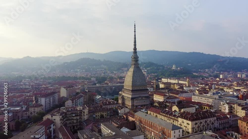 Turin, Italy. Flight over the city. Mole Antonelliana - a 19th-century building with a 121 m high dome and a spire, Aerial View, Point of interest photo