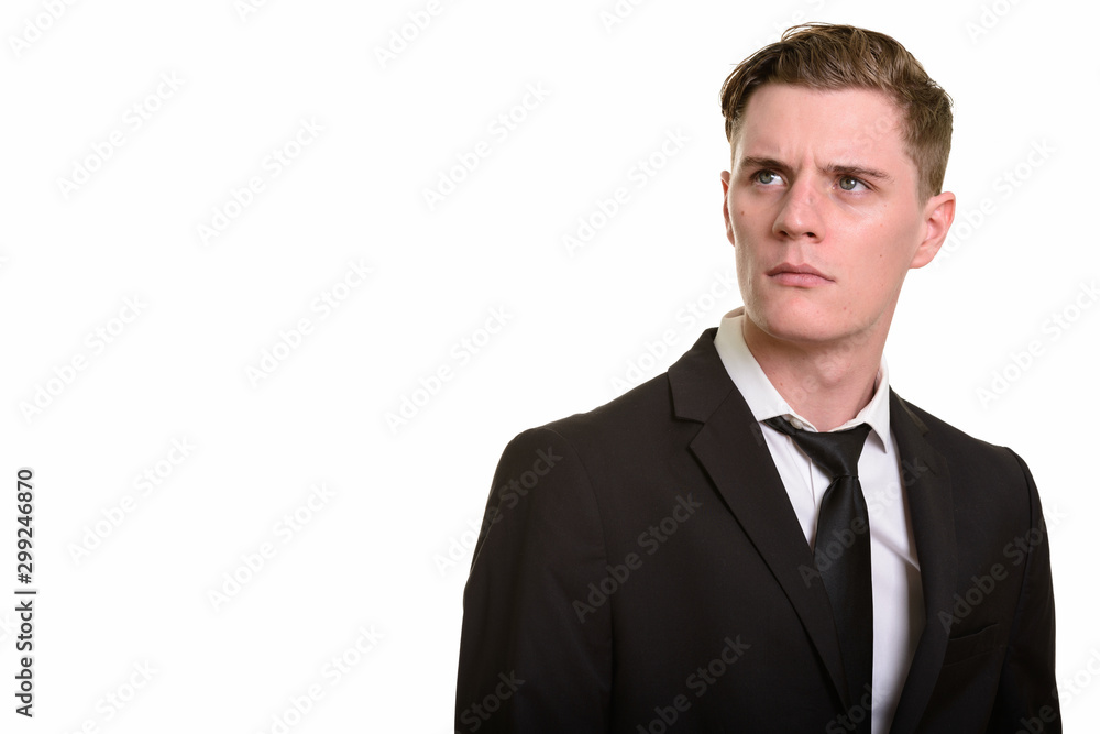 Face of young handsome blonde businessman in suit Face of young handsome blonde businessman in suit