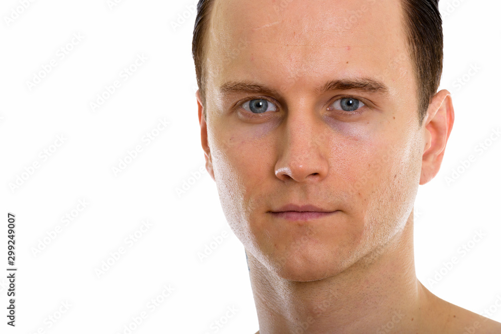 Fototapeta premium Studio shot of face of young handsome man shirtless