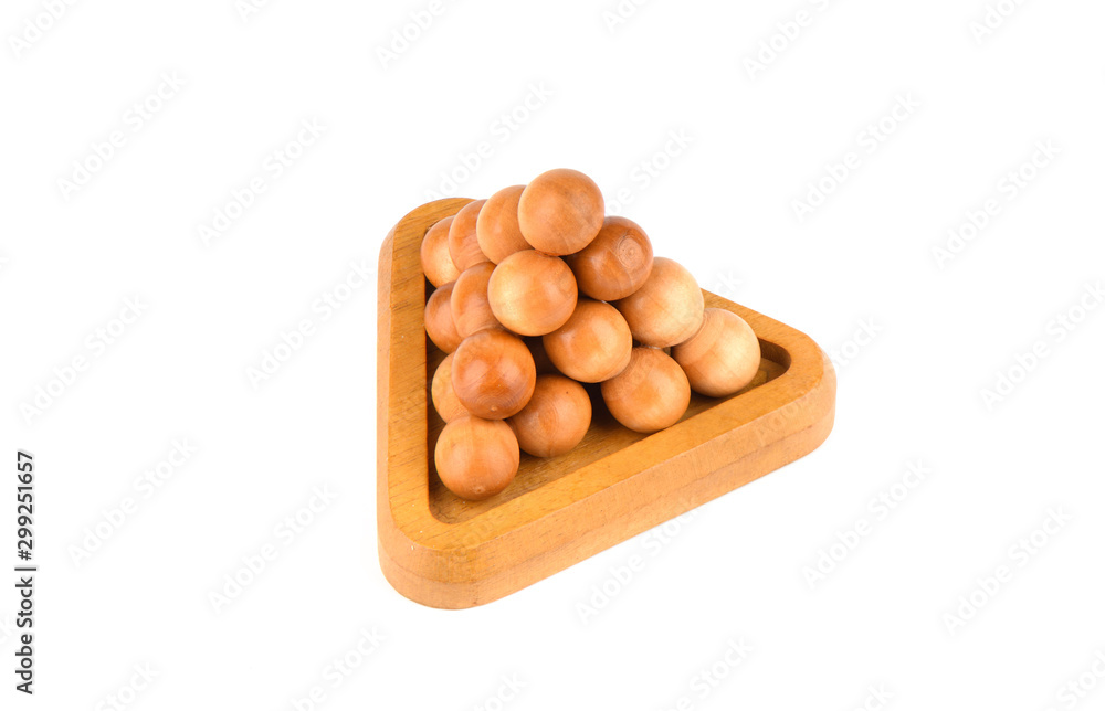Top view. Three-dimensional puzzle pyramid of balls isolated on a white background. Top view. Three-dimensional puzzle pyramid of balls isolated on a white background.
