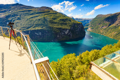 Camera on tripod taking fjord photo, Norway photo