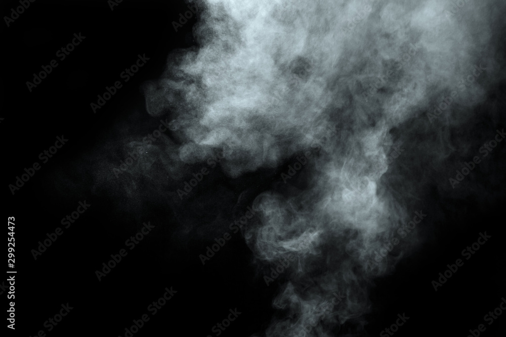 Abstract  powder or smoke isolated on black background