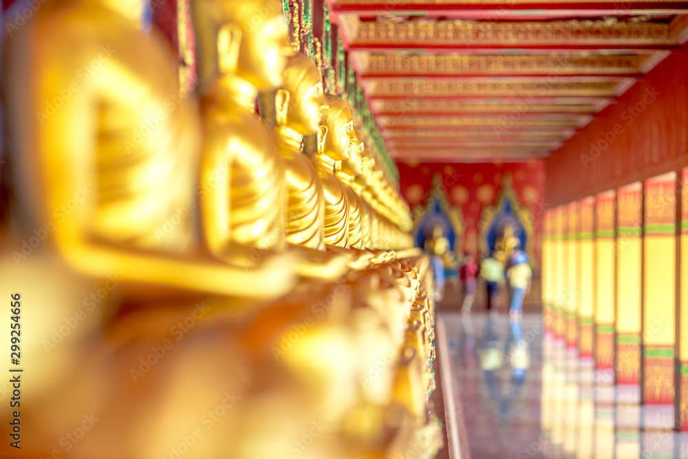 Fototapeta premium The beautiful sculpture background of, Wat Bang Thong, surrounded by trees, has a large area, is a religious tourist attraction in Krabi, with tourists always visiting, Thailand