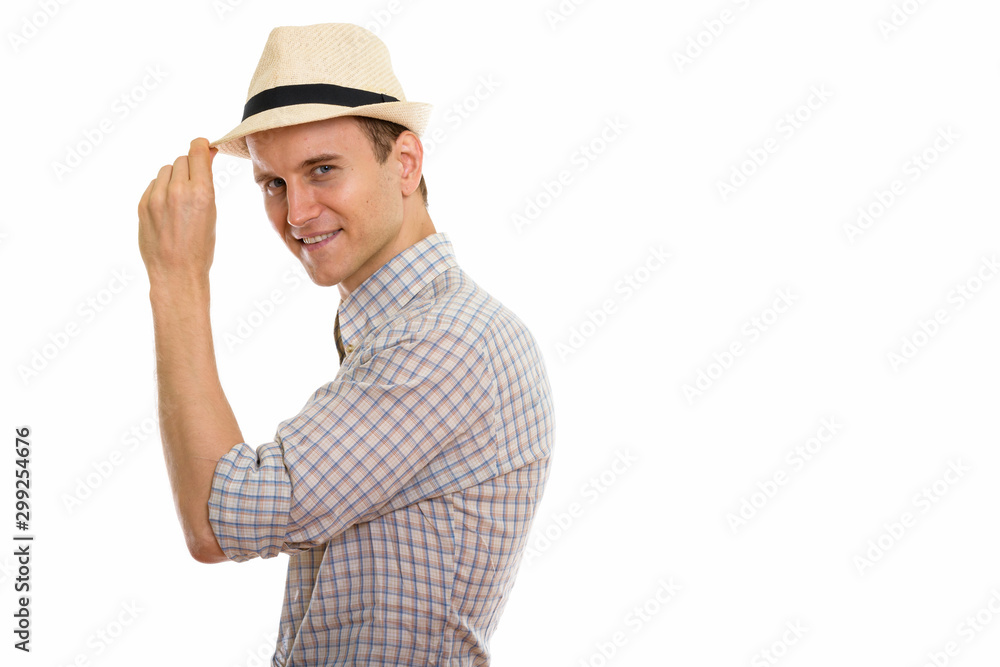 Portrait of young handsome tourist man wearing hat Portrait of young handsome tourist man wearing hat