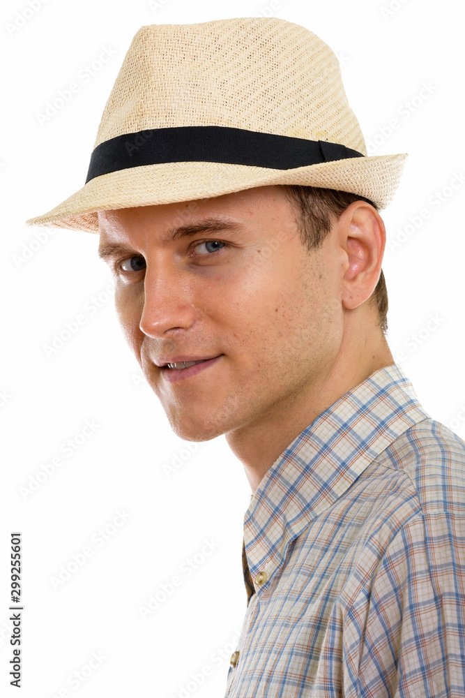 Portrait of young handsome tourist man wearing hat Portrait of young handsome tourist man wearing hat