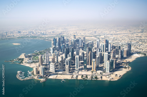Aerial Wide Shot of Modern Skyscrapers and Apartment Buildings in Downtown Doha (West Bay) on a Sunny Clear Day - Doha, Qatar © Nate Hovee