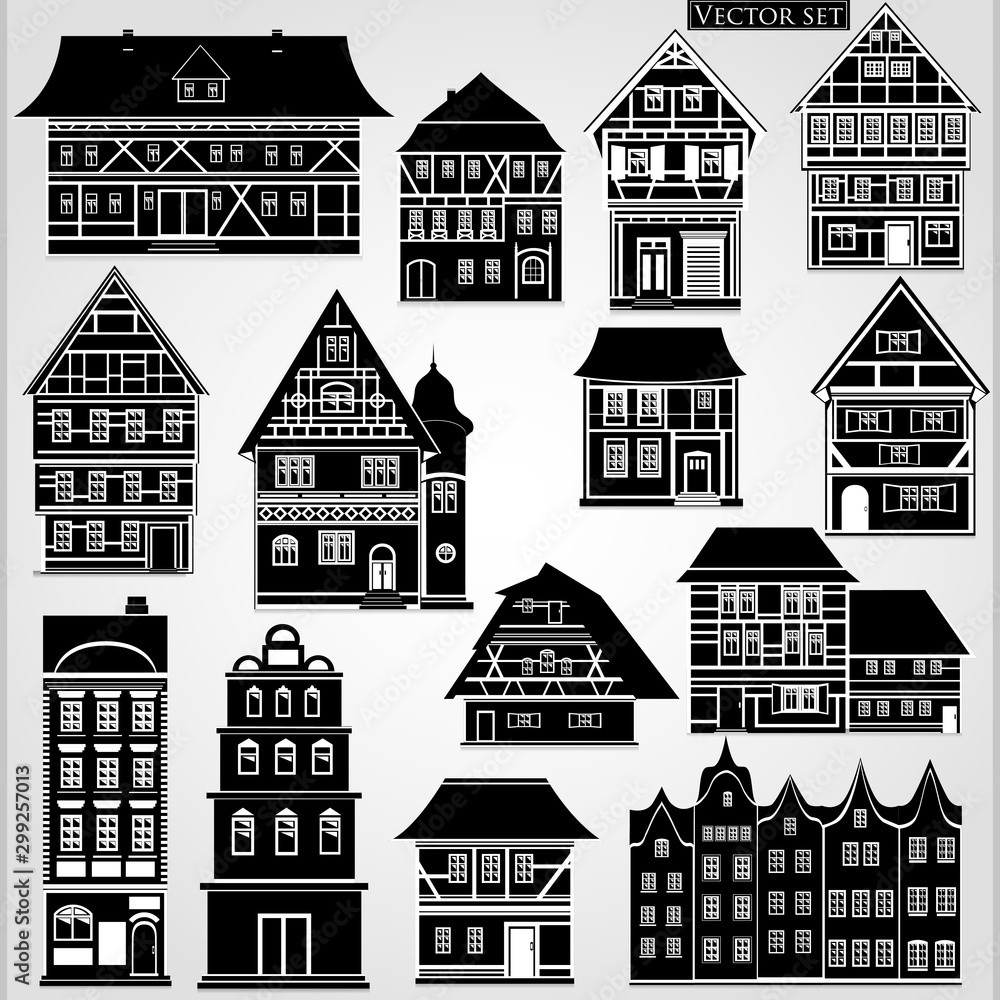 Set of European houses and buildings in a traditional style in black and white on a gray background.