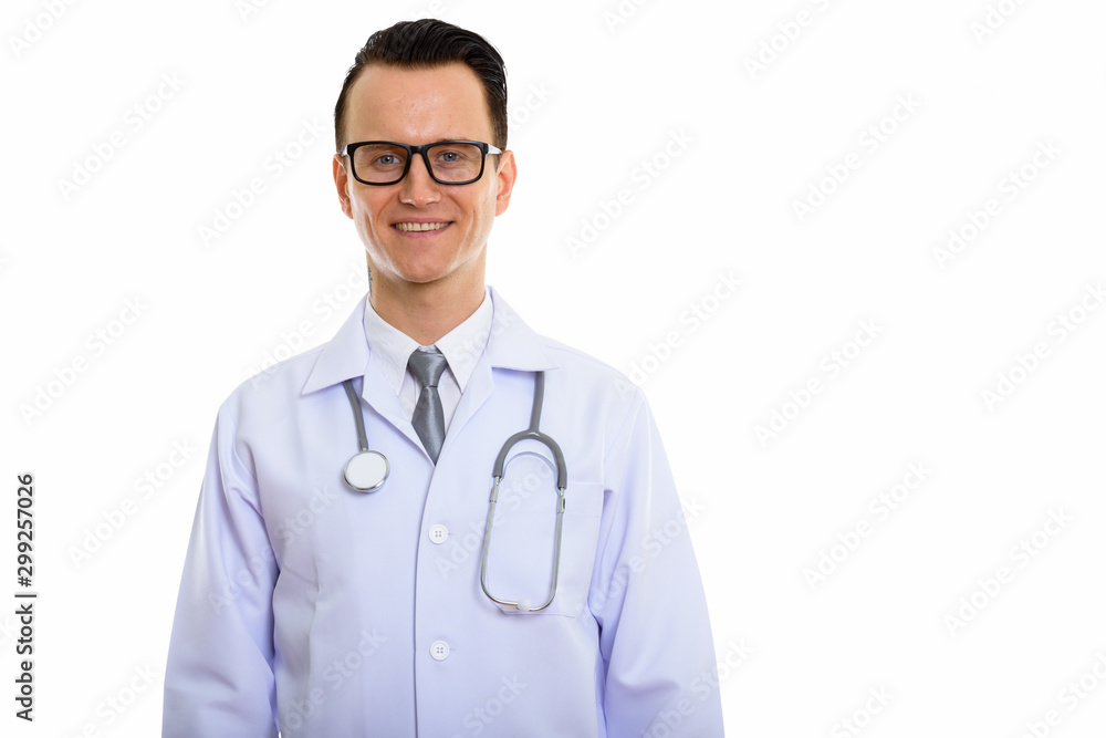 Portrait of young handsome man doctor with eyeglasses
