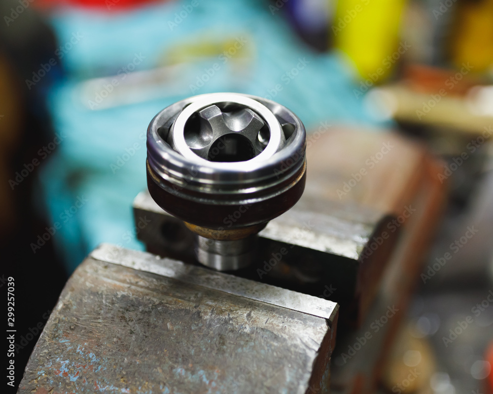 ATV constant-velocity CV joint repair in old garage ATV constant-velocity CV joint repair in old garage