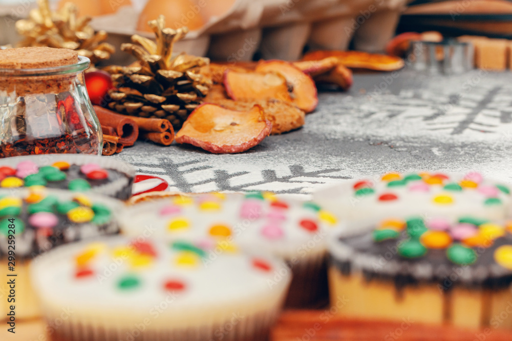 Christmas muffins with icing close up on table Christmas muffins with icing close up on table