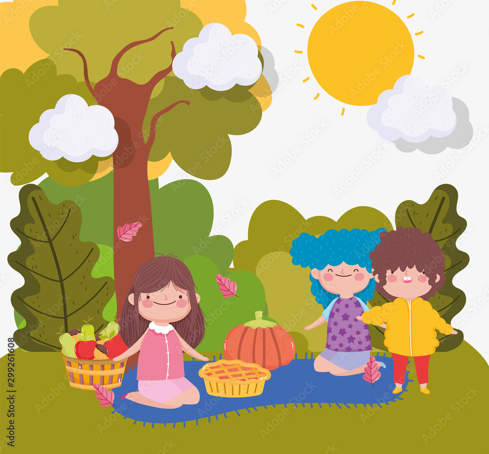 Fototapeta premium happy thanksgiving family, kids with food on blanket in the park