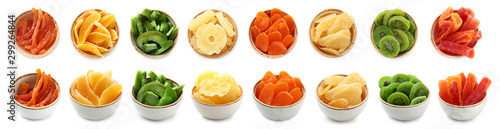 Fotografie Bowls with different dried fruits on white background