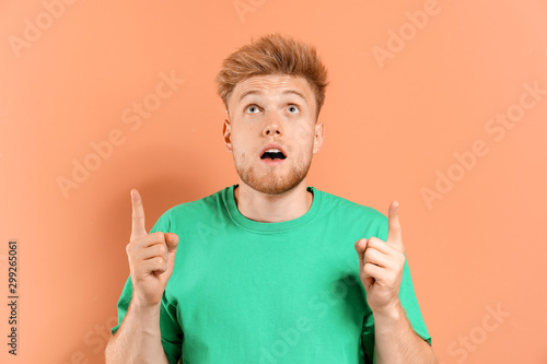 Portrait of surprised man p...