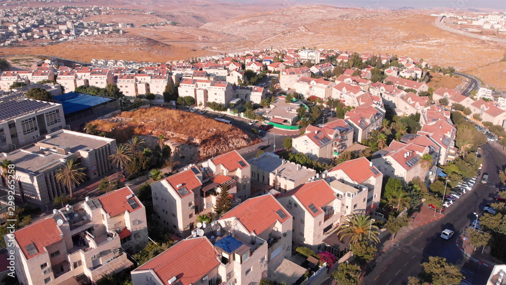 Aerial Image over Small town with red Rooftops in the desert, Israel