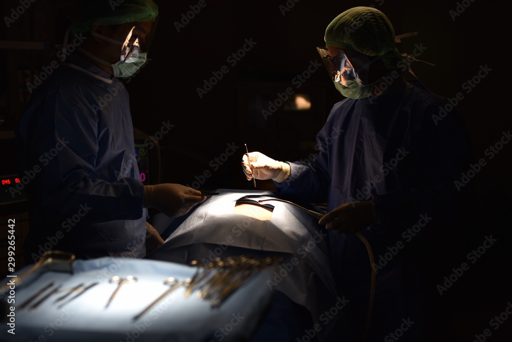 Medical Team Performing Surgical Operation in Modern Operating Room. Equipment and medical devices in hybrid operating room