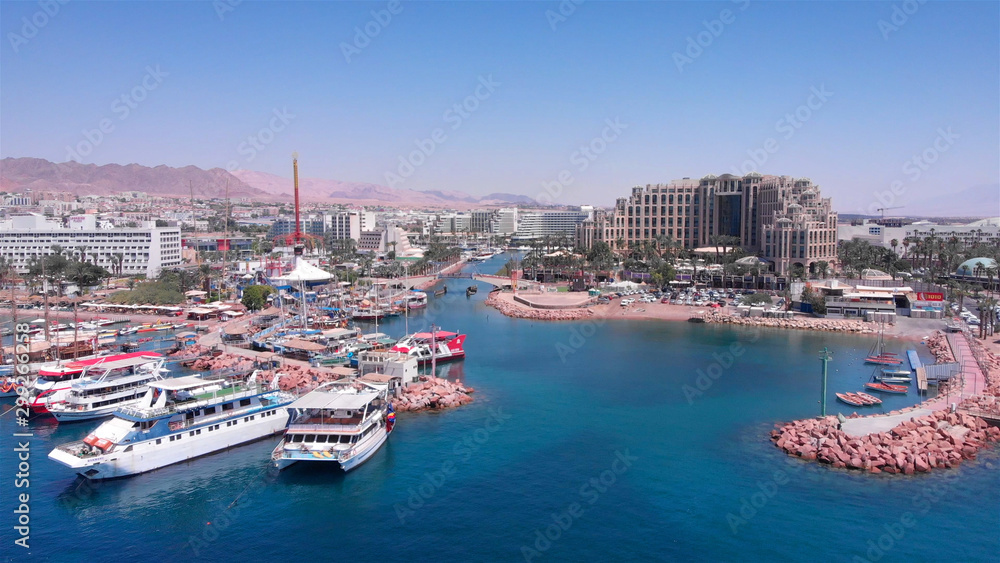 Drone Image over Eilat shoreline With Marina boats And hotels in the summer
