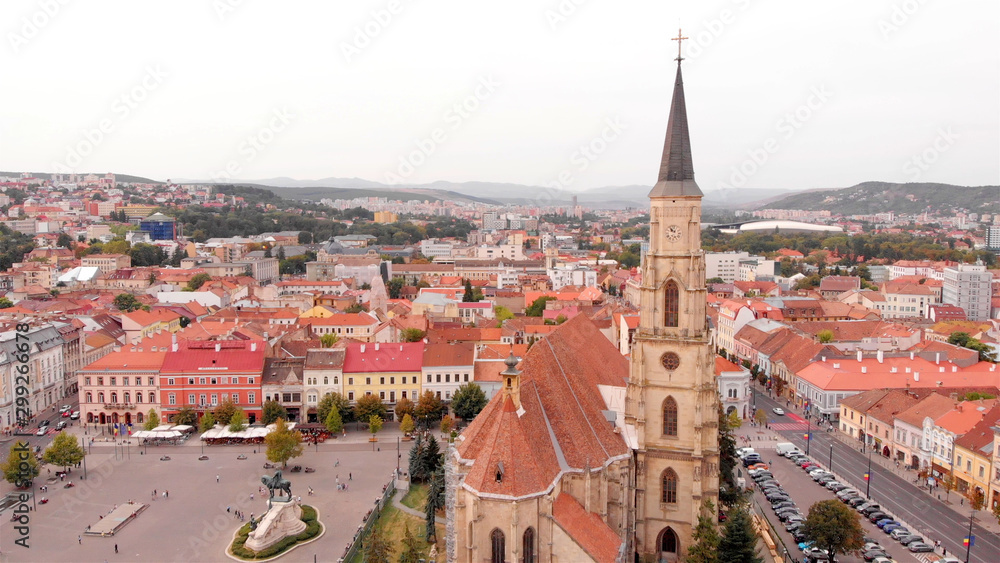 Aerial Image over church medieval tower in Romania Aerial view of Cluj, in the heart of Transylvania, Romania. church medieval tower 