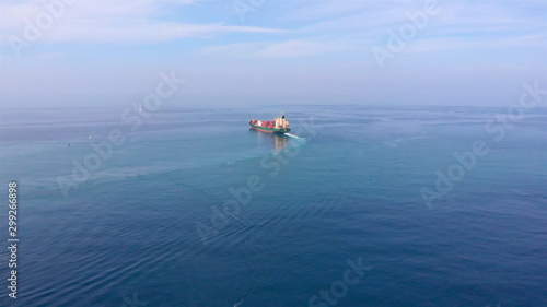 Drone Image of Cargo Tanker Sailing in Mediterranean Sea   Aerial view of Container Ship in Mediterranean water © ImageBank4U