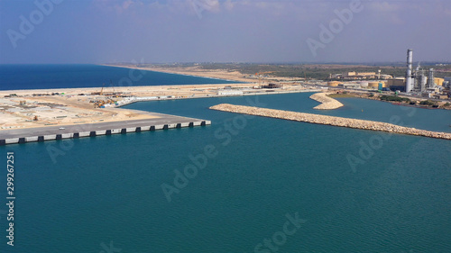 Aerial Image over Harbor Under Construction in Israel Drone view over Ashdod New port under Construction with coastline in the background, Israel