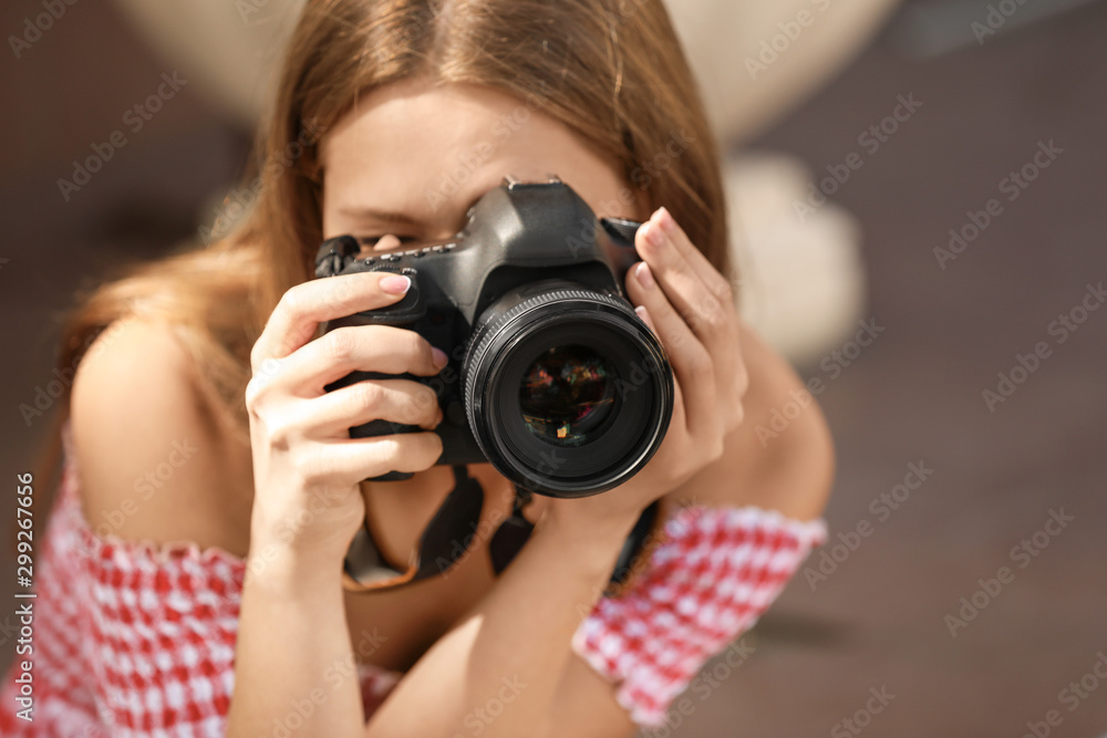 Beautiful female photographer with camera outdoors Beautiful female photographer with camera outdoors