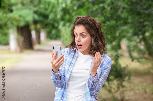 Surprised young woman with ...