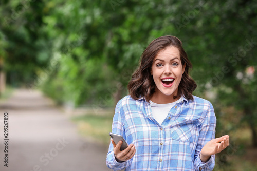 Surprised young woman with ...