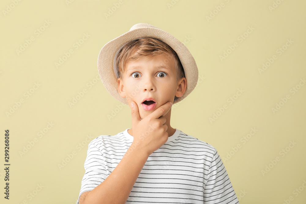 Surprised little boy on color background Surprised little boy on color background