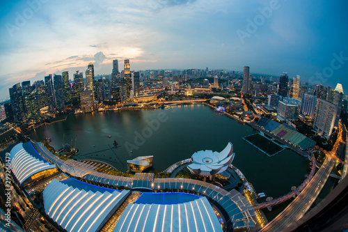Aerial view of Singapore skyline and Marina Bay at sunset