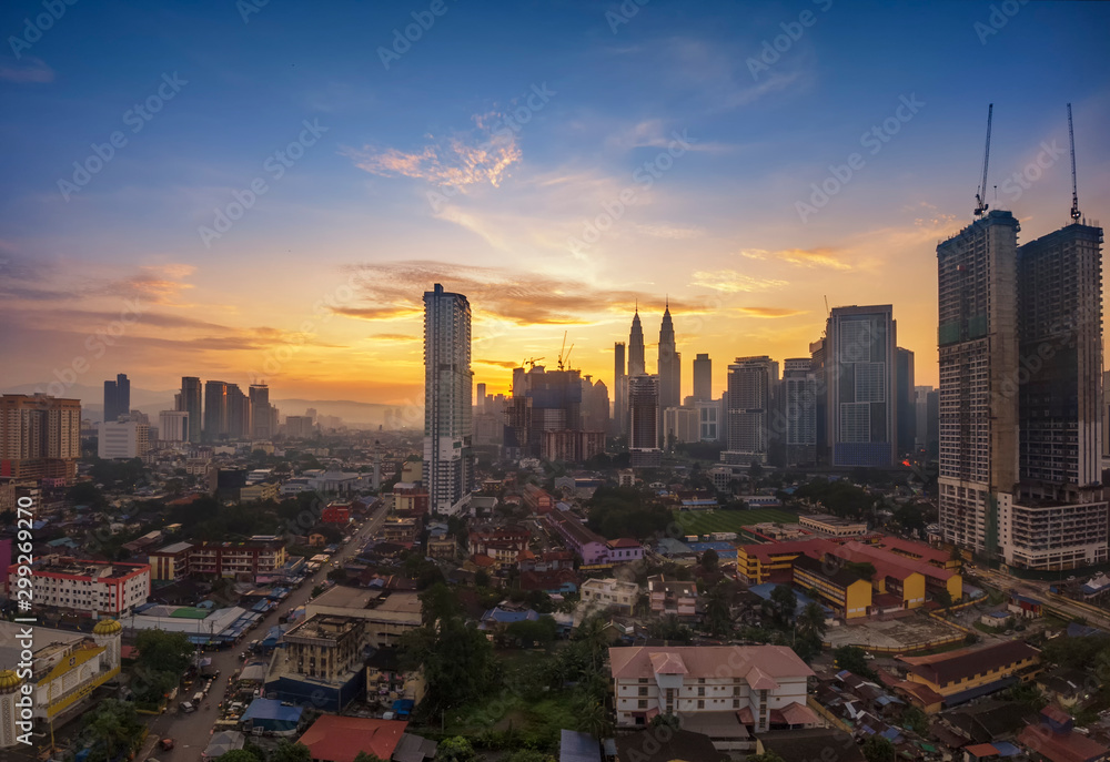 Fototapeta premium Beautiful scenery of Kuala Lumpur City Centre with sunrise sky background
