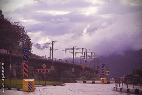 rain clouds and clouds over the city and mountains photo