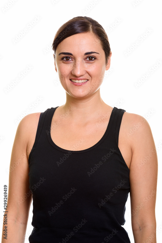 Studio shot of happy beautiful woman smiling Studio shot of happy beautiful woman smiling