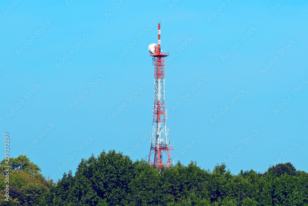 Station of mobile communication against a blue sky. tv tower