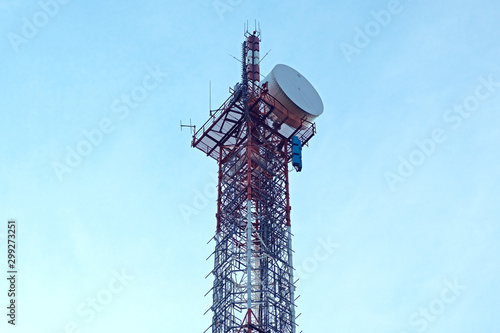 Station of mobile communication against a blue sky. tv tower