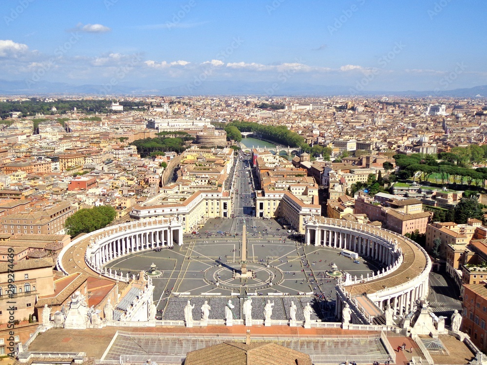 Aerial View of St. Peter's Square, Vatican City, and Rome from the top of St. Peter's Basilica - Vatican City, Rome, Italy 