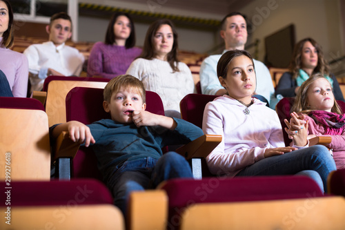 People audience attending movie night